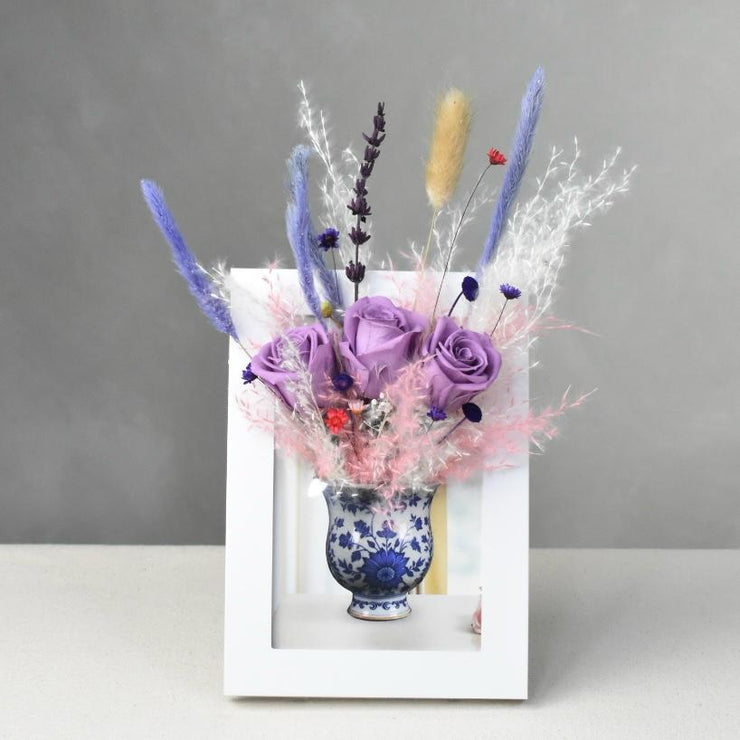 Blue porcelain vase with roses